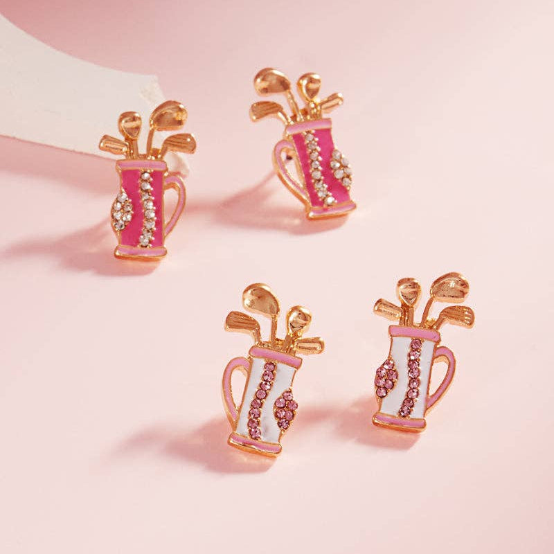 2 sets of earrings featuring golf bags. one set has white golf bags with light pink and gold details. the other set has dark pink bags with light pink and gold details.