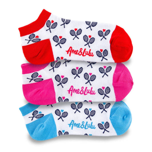 Three pairs of patterned ankle socks stacked in red, pink, and blue with tennis racket design and logo visible