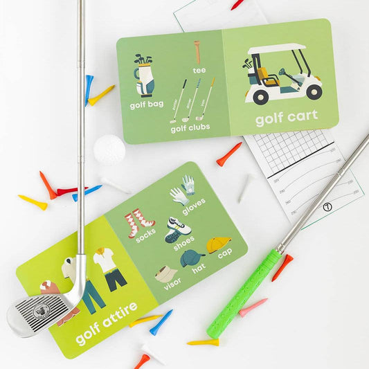 Golf book opened so that you can see some of the pages. Pages include images of golf carts, golf clubs, golf attire, and a golf bag with the names of each item written underneath.