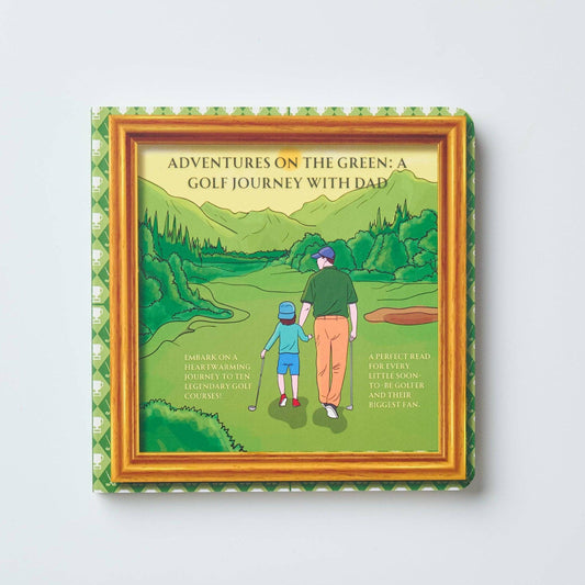 Book titled 'Adventures on the Green: A Golf Journey with Dad' featuring a illustration of a man and child on a golf course.