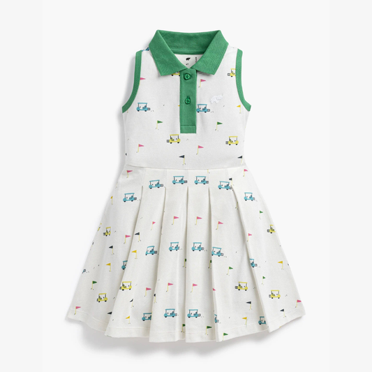 White dress with green collar and colorful golf pattern on a white background