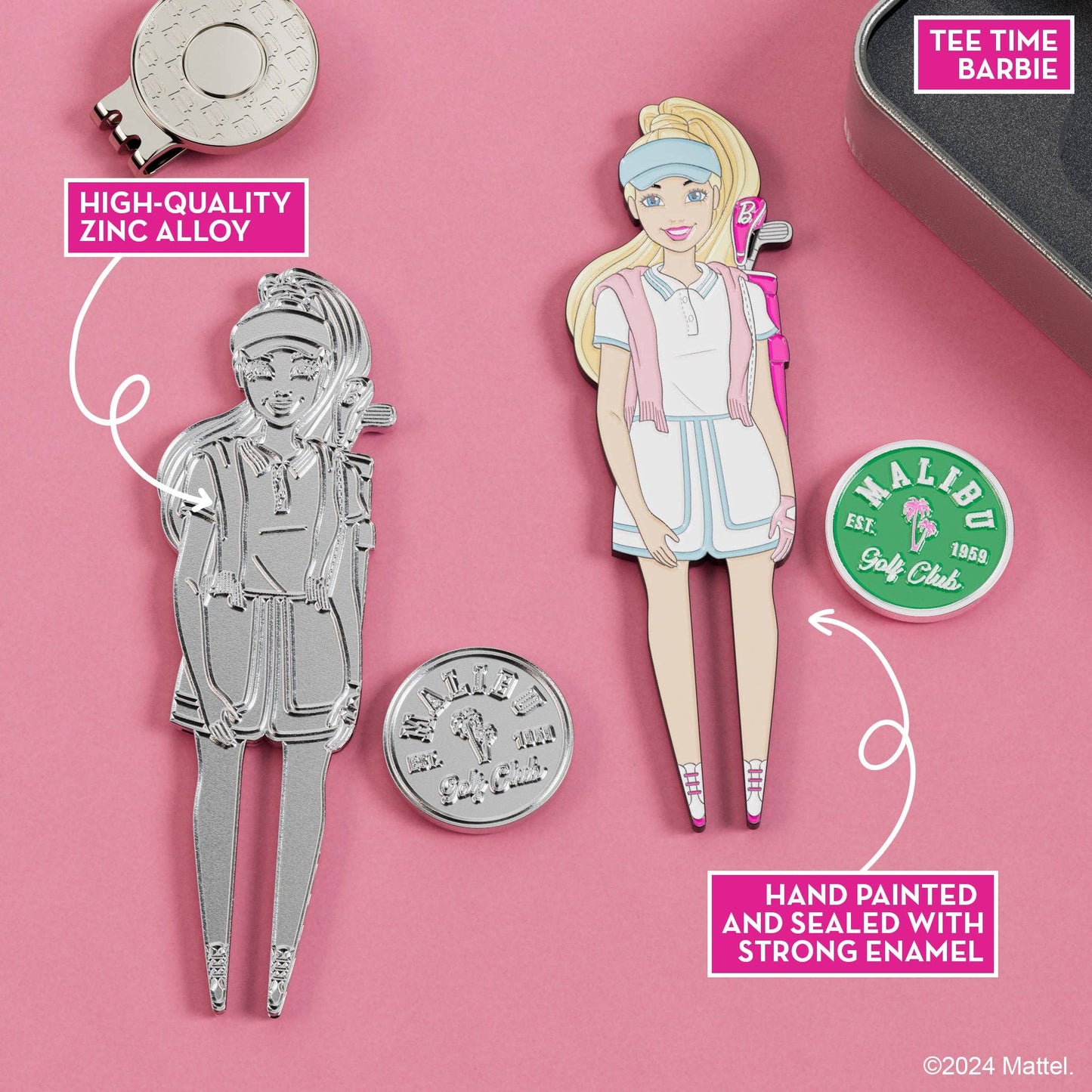 Close-up of Tee Time Barbie golf divot tool and Malibu Golf Club magnetic ball marker with hand-painted enamel details