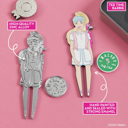 Close-up of Tee Time Barbie golf divot tool and Malibu Golf Club magnetic ball marker with hand-painted enamel details