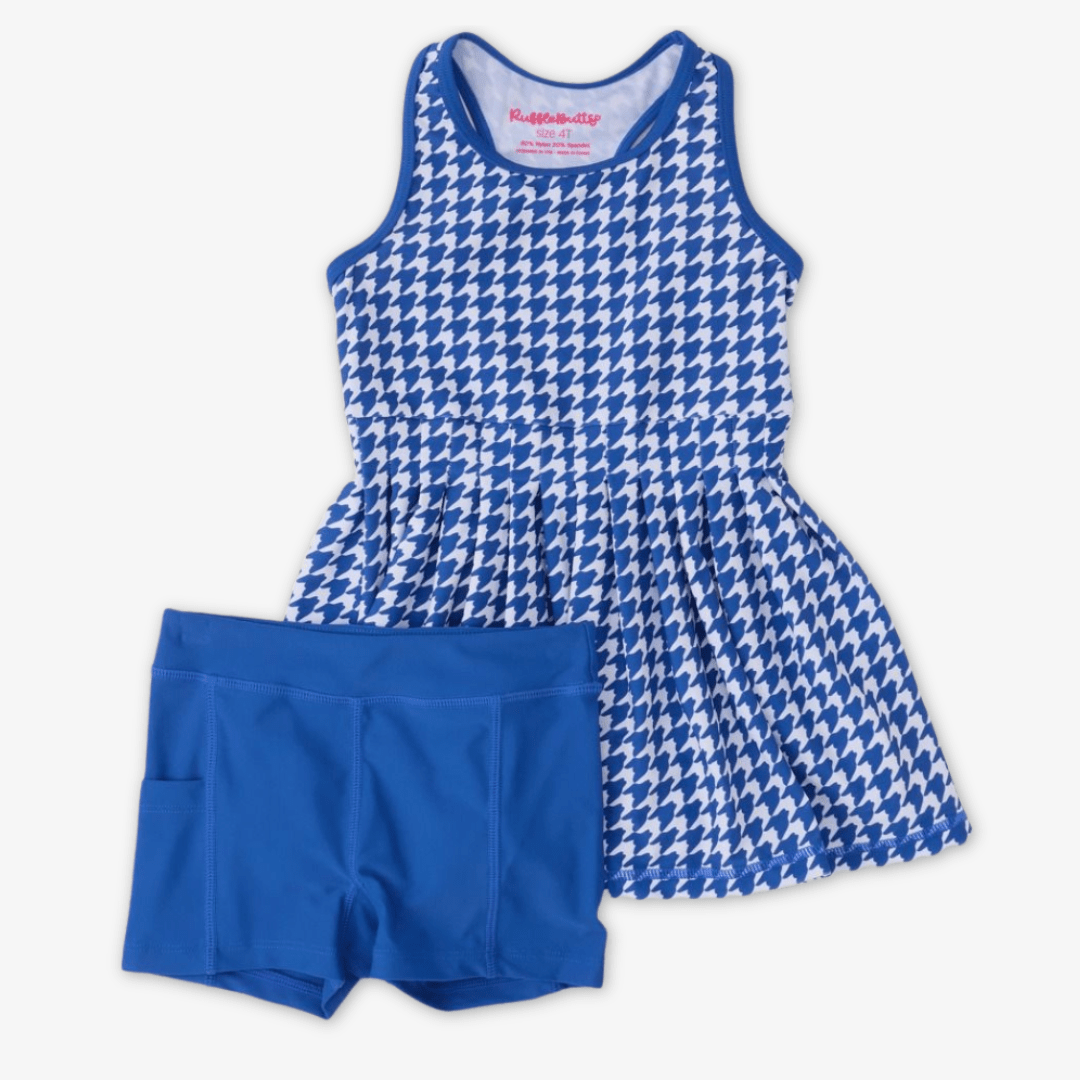 Blue and white houndstooth patterned tank top dress and solid blue shorts, displayed on a light gray background.