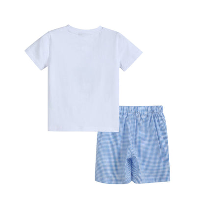 Back view of toddler golf shirt and blue gingham shorts set on white background
