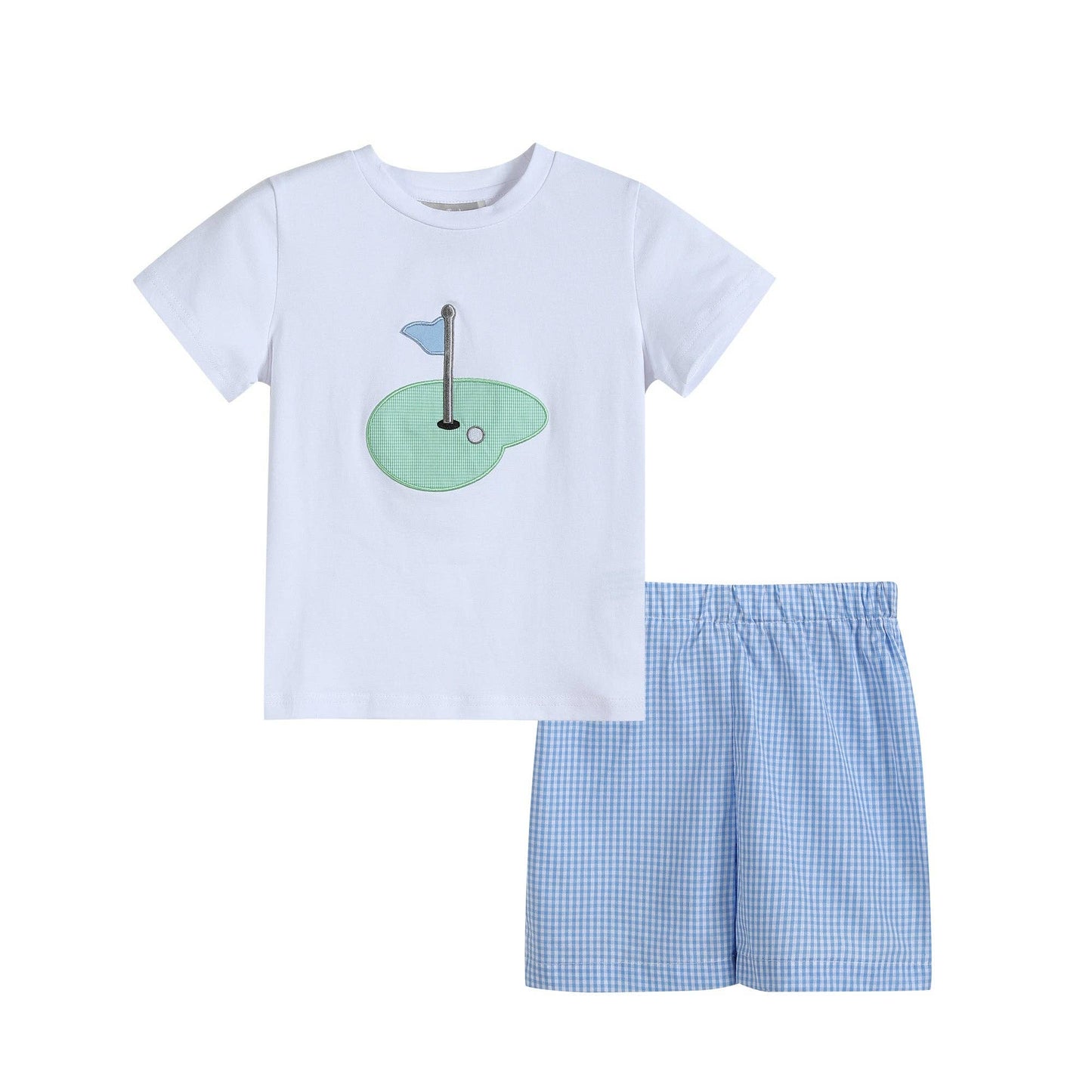 Golf hole shirt and shorts set laid flat showing golf flag appliqué and gingham shorts