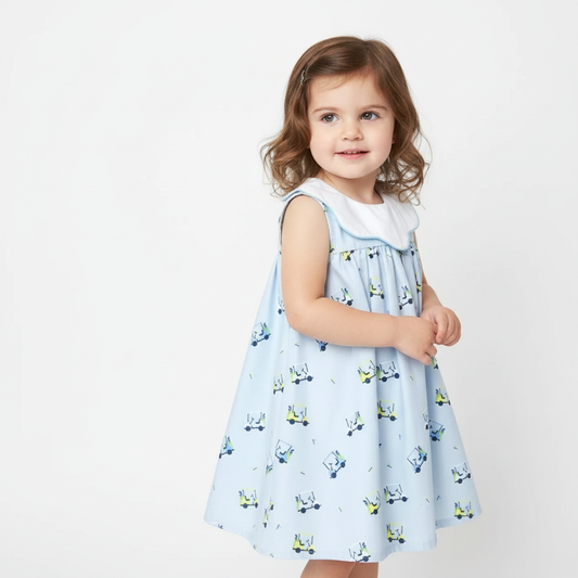 Toddler girl wearing the Tatum Girl Golf Dress in a light blue golf cart print, styled for a timeless Southern look