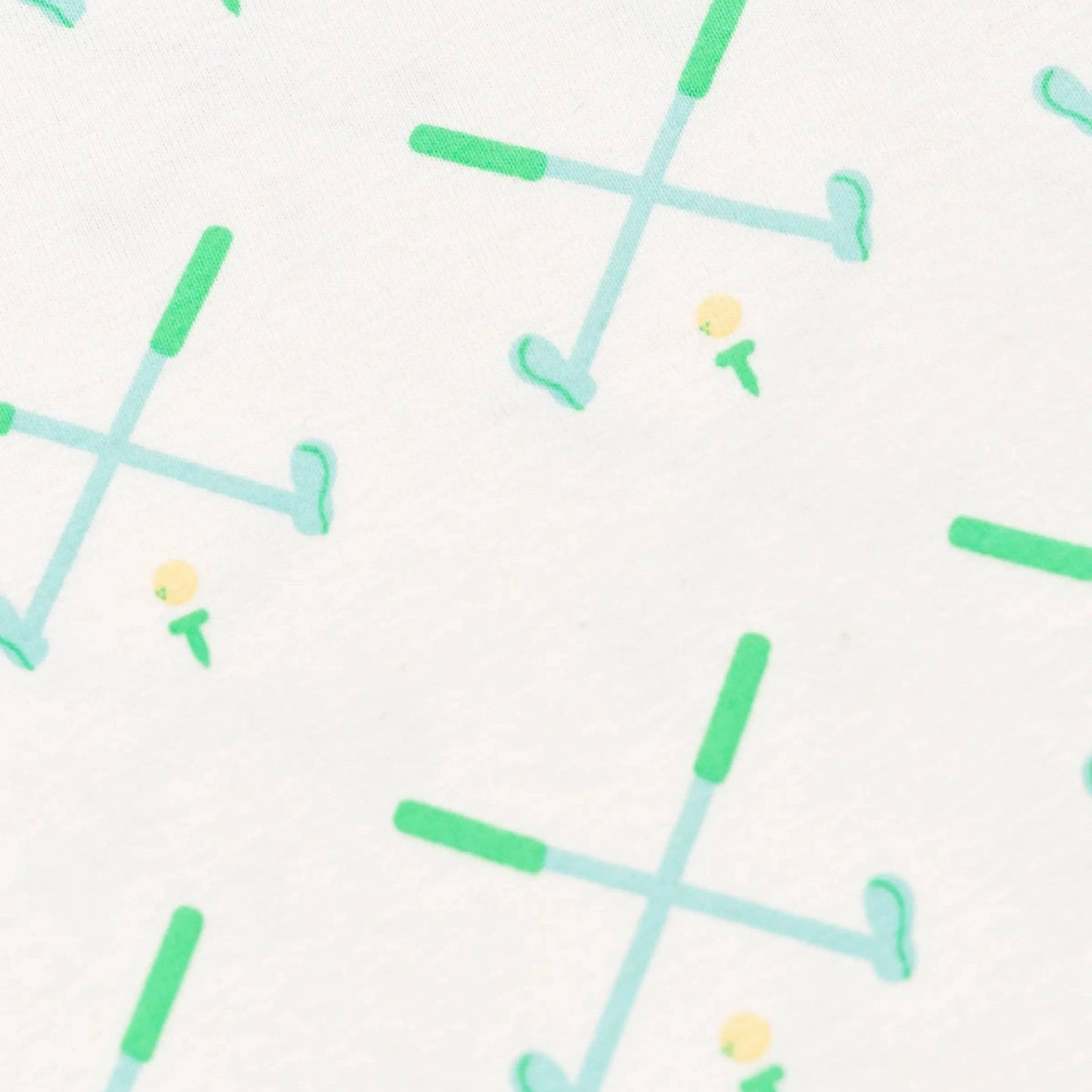 golf pattern with green crossed golf clubs and yellow ball