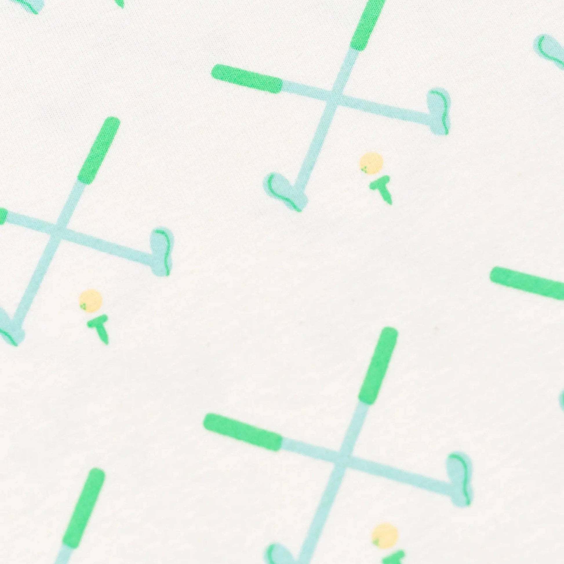 golf pattern with green crossed golf clubs and yellow ball