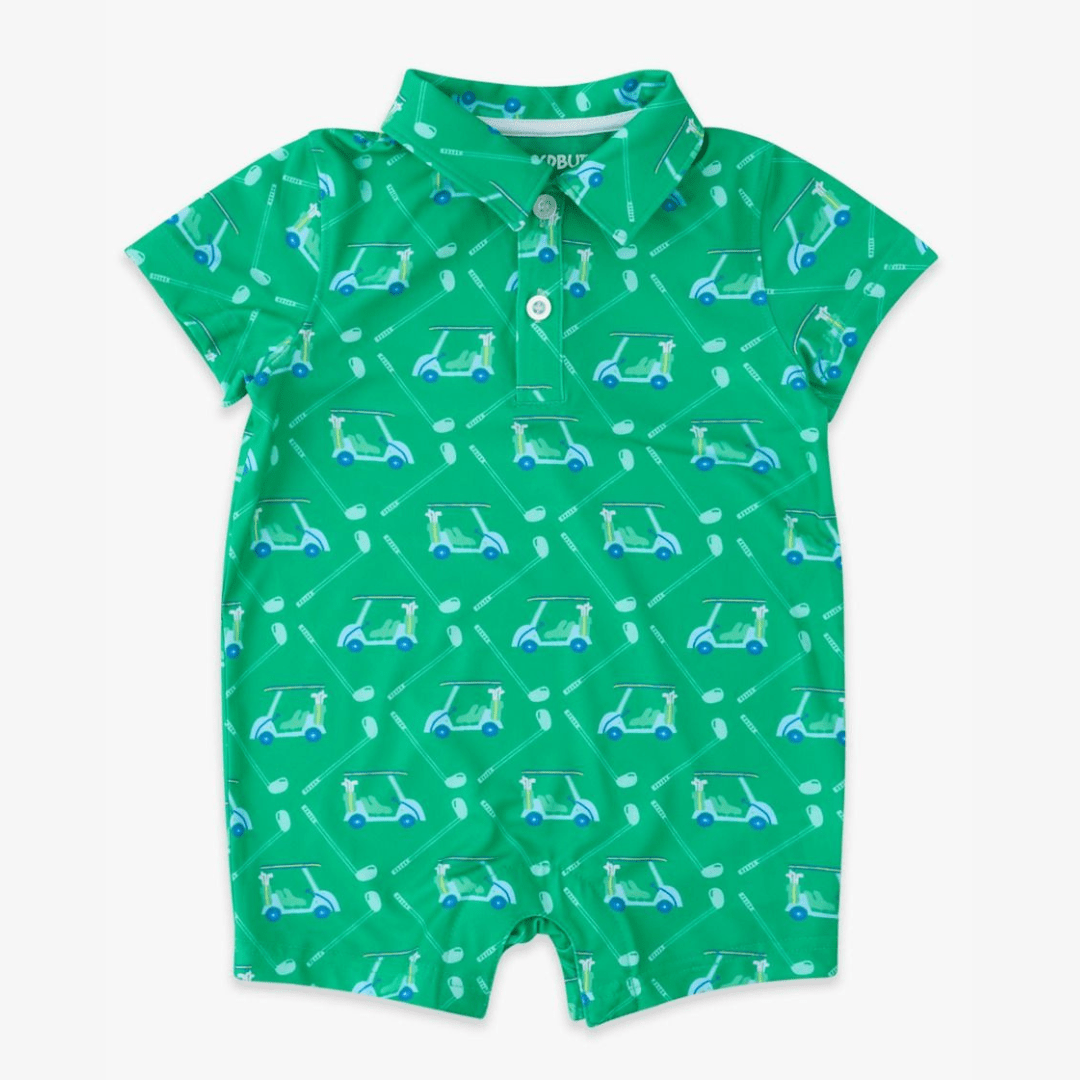 A bright green baby romper with cheerful golf carts alongside crisp white clubs, creating a pattern that’s full of motion and sporty charm.
