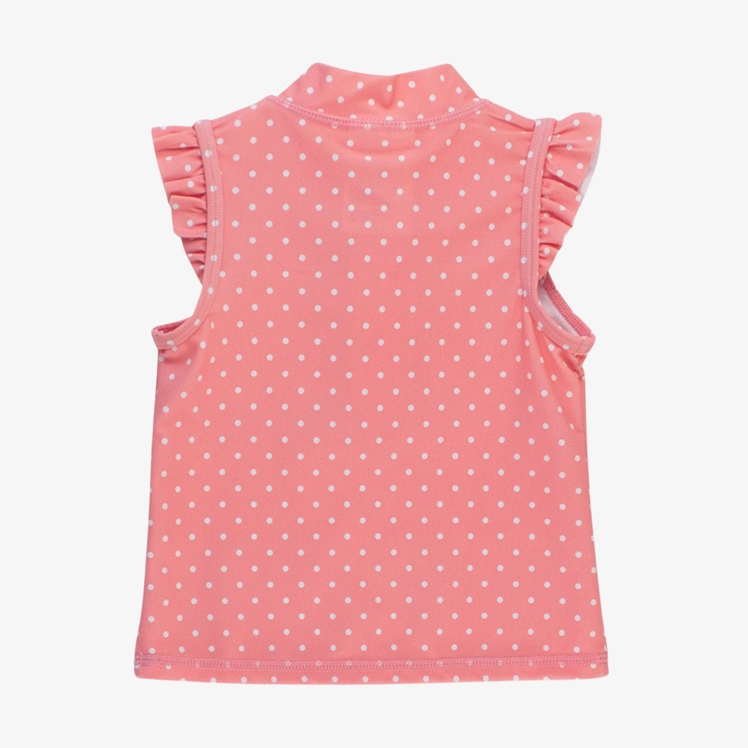 Back view of pink polka dot sleeveless girls top with ruffle shoulders
