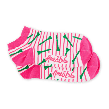 Pink and white striped ankle socks with green golf tee pattern and Ame & Lulu logo, stacked pair on white background