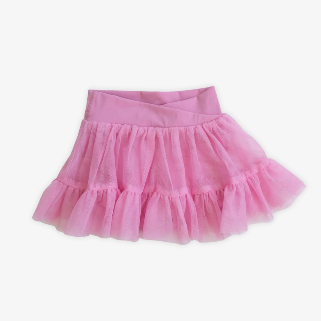 Ashlyn Athletic Skort in carnation pink with layered tulle overlay and built-in shorts for girls activewear
