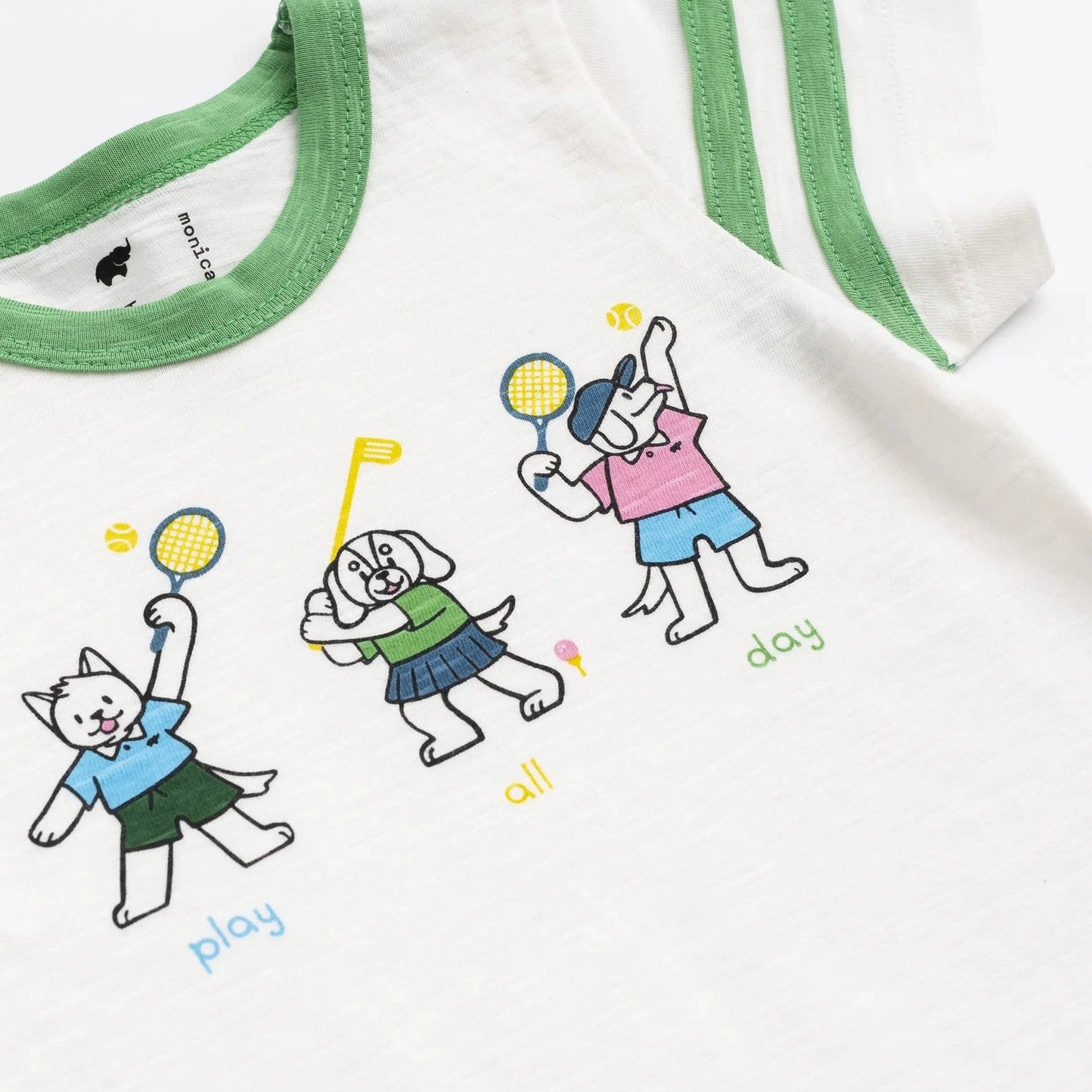 Children's t-shirt with cartoon characters playing golf and tennis and text on a white background