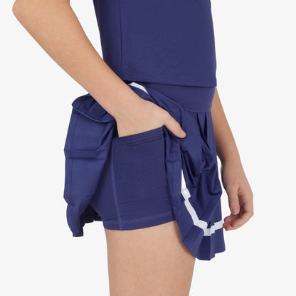 Side view of girls tennis skort showing attached inner shorts and contrast trim detail