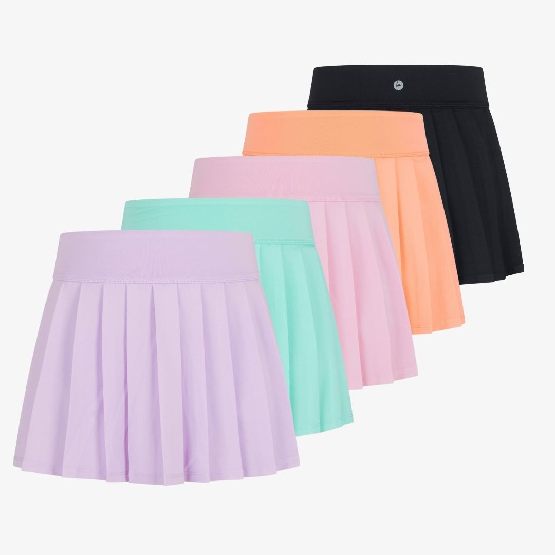Girls jersey pleated everyday skort shown in multiple color options including lavender, mint, pink, coral, and black