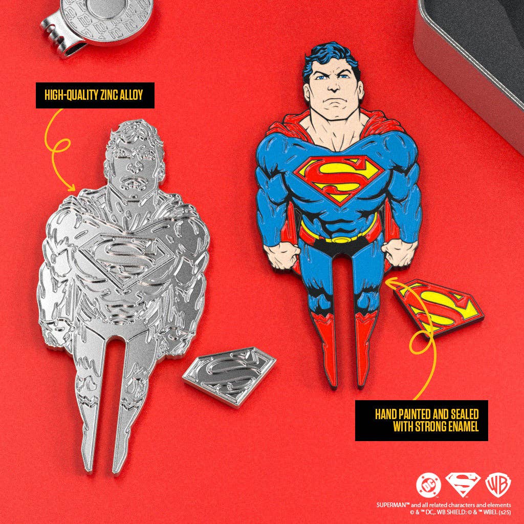 Front and back view of Superman divot tool and S-Shield ball marker showing hand-painted enamel and metal construction