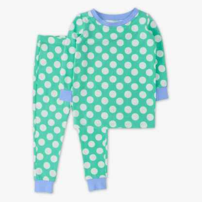 A two-piece children's pajama set featuring a mint green and white golf ball on tee pattern with light blue trim on the collar, cuffs, and pocket edges, displayed on a light gray/white background.